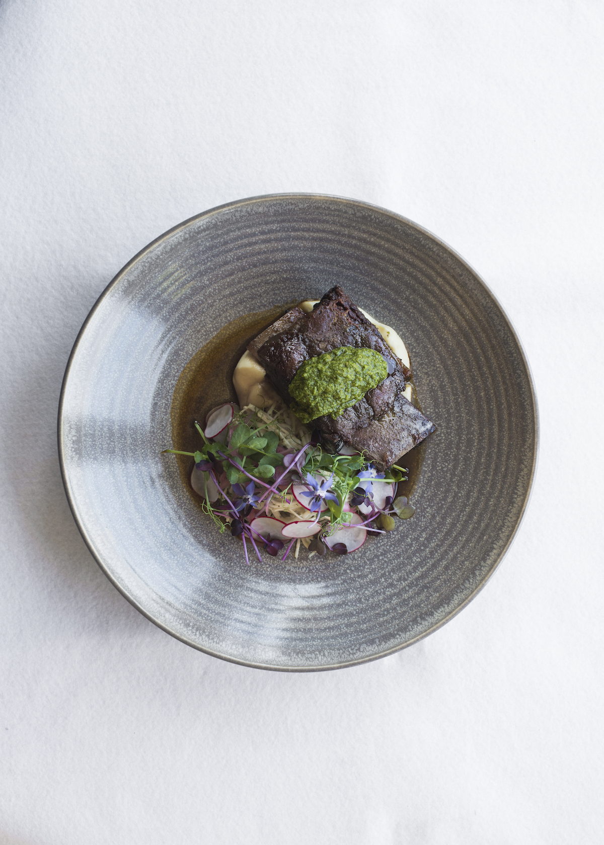 Archive Bar and Bistro, Mudbrick dish: Slow cooked Silver Fern Farms beef short rib with celeriac and fennel remoulade, radish and garden herbs. 