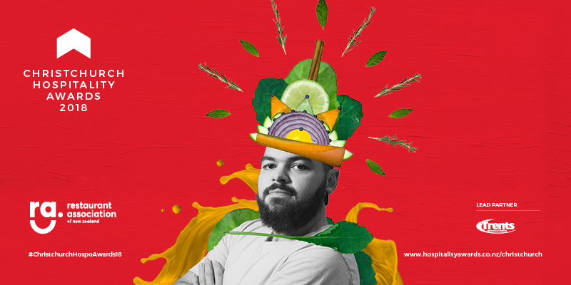 A banner advertising the Christchurch Hospitality Awards featuring a man in an outfit made from fruit