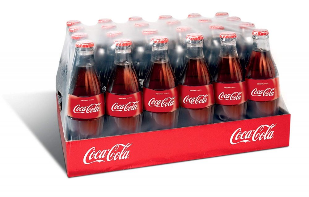 COCA-COLA DIVESTS ITS CANADA BOTTLING DIVISION