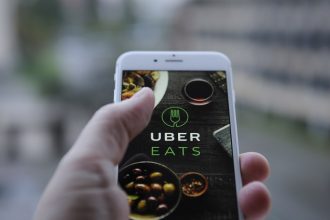The Uber Eats app opening screen is seen on an iPhone
