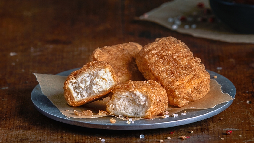 BP's chicken bites piled on a plate as though they are gourmet and not delightfully flavoured piles of glue and MSG