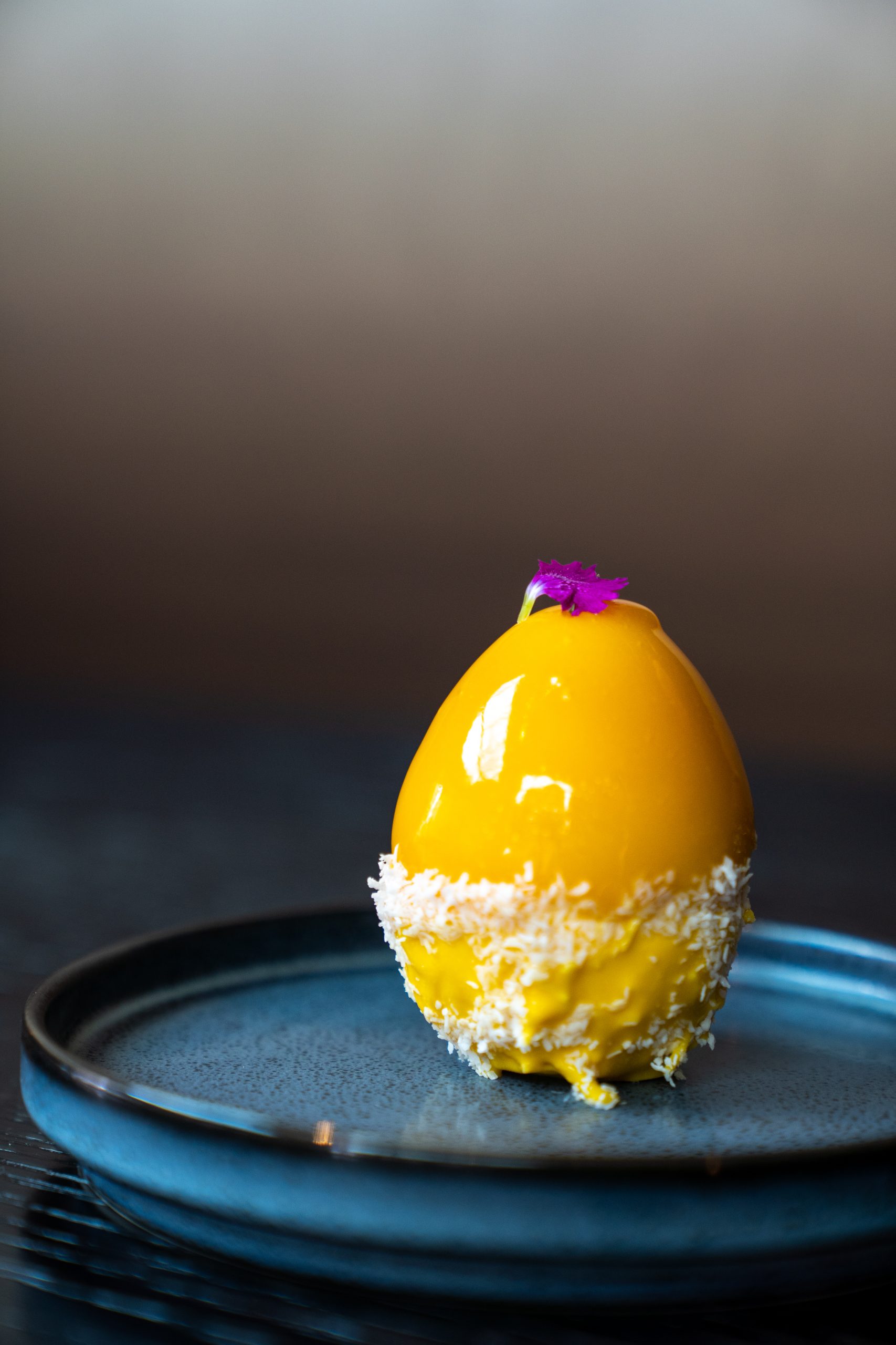 Tropical egg Coconut sponge-vanilla mousse-tropical curd-passion fruit glaze