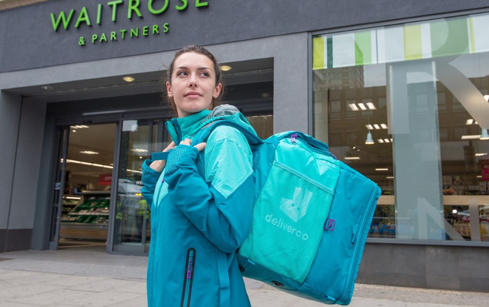 Girl with food delivery backpack