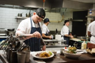 Stott cooking in kitchen
