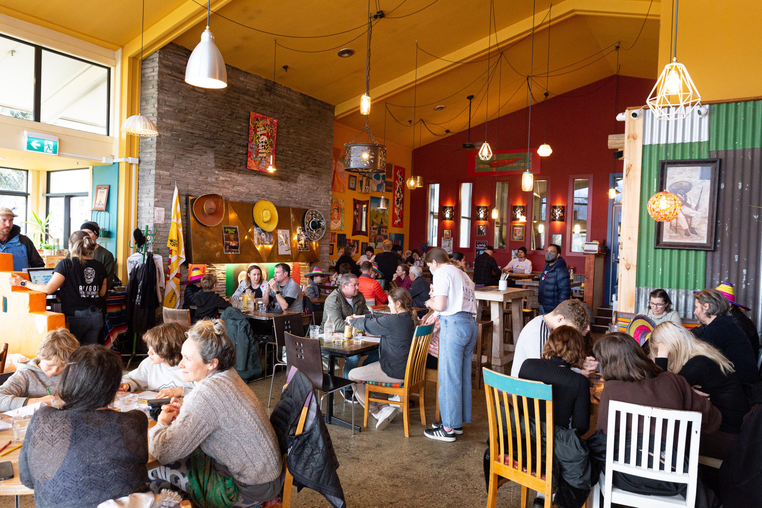 Amigos restaurant with tables filled of customers