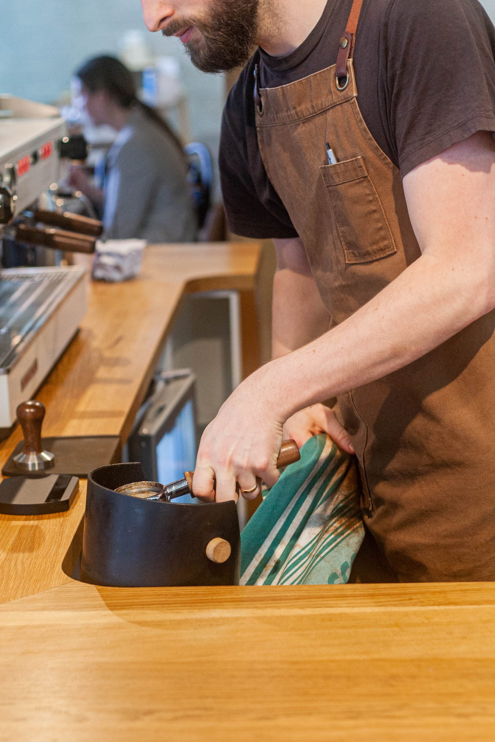 man making coffee