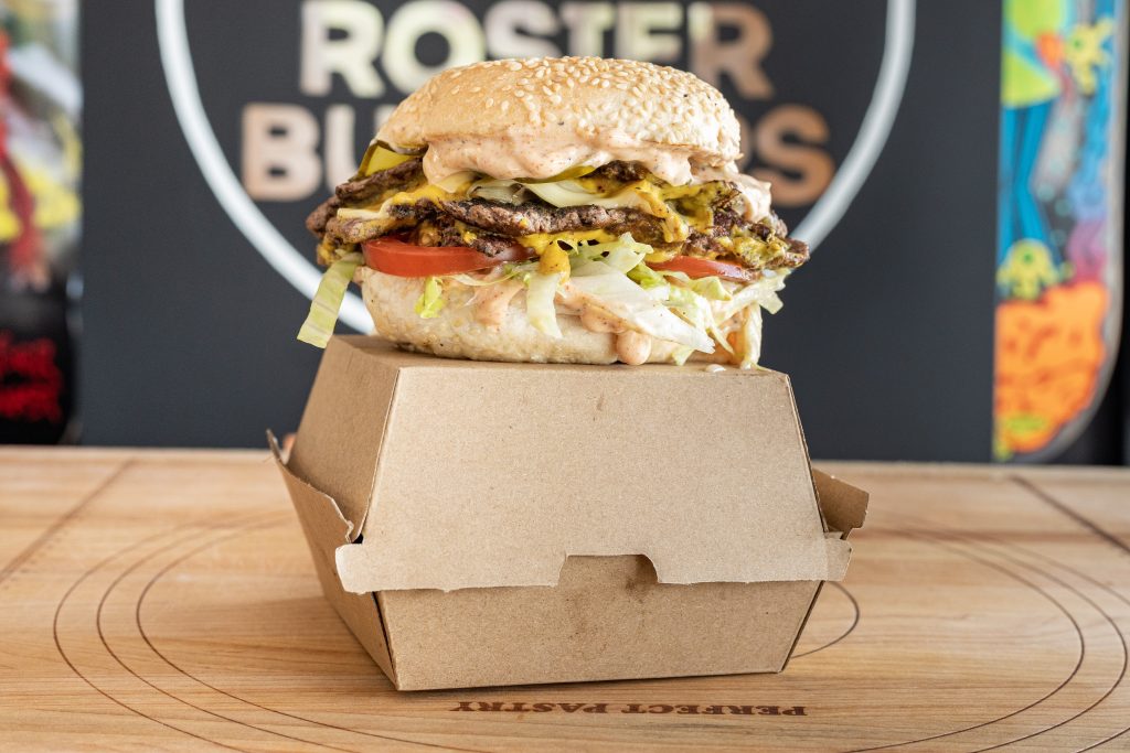 burger sitting on top of a burger box