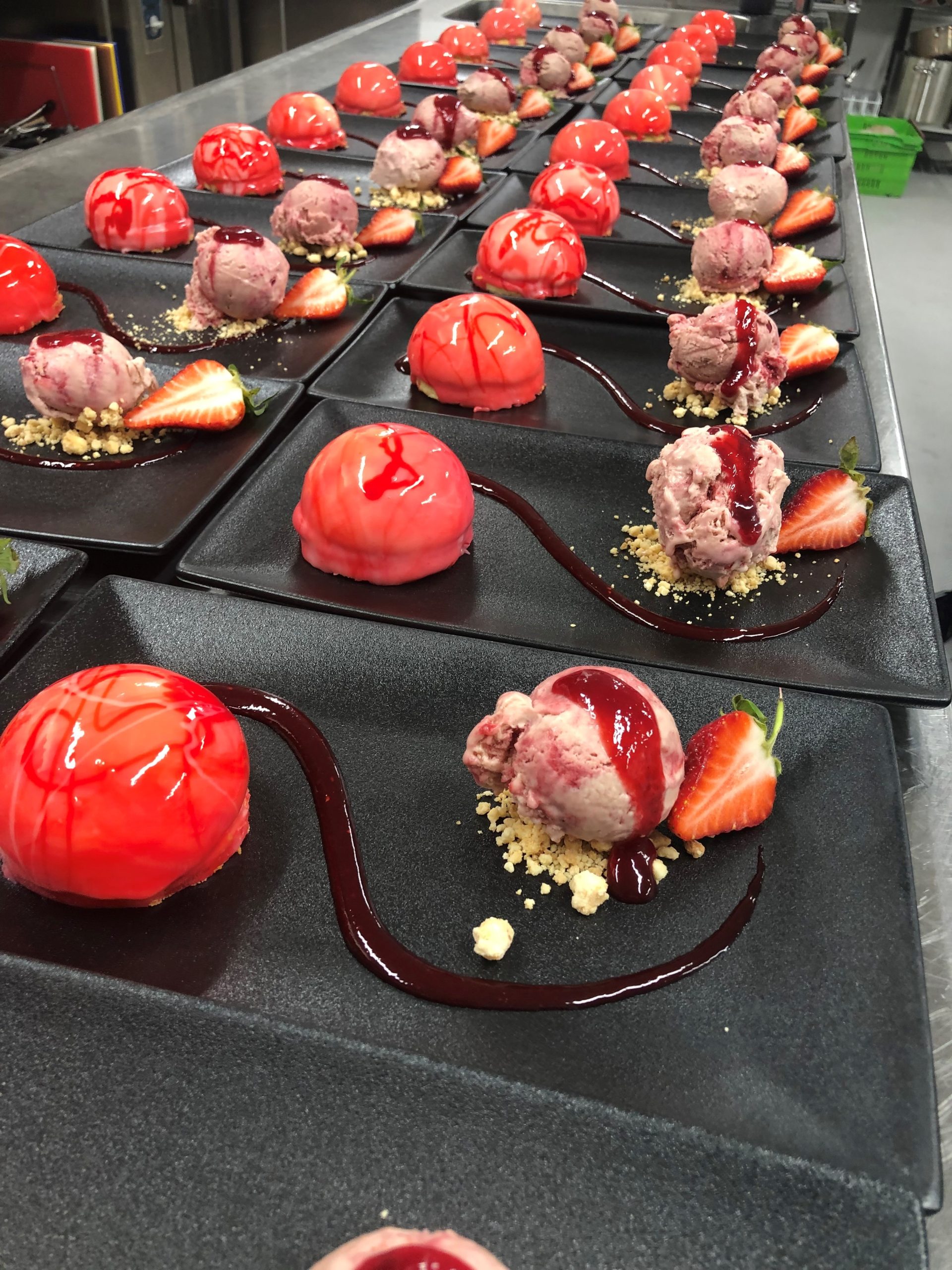 Mirror glazed White chocolate mousse with caramelized chocolate crumb and homemade berry ice cream