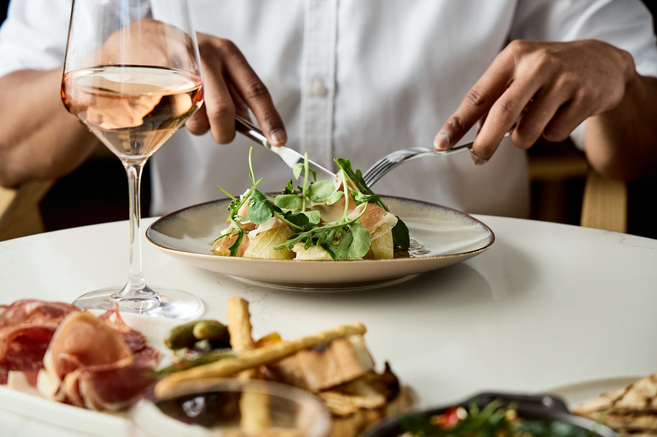 Salad of Prosciutto, fior di latte, pomelo, watercress & vincotto